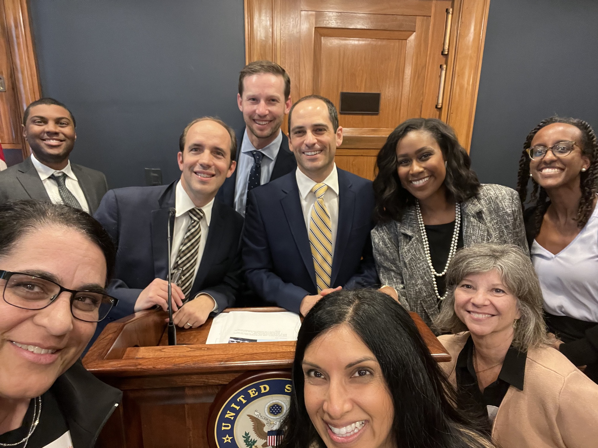 Healthcare advocates meeting at a congressional podium on Capitol Hill